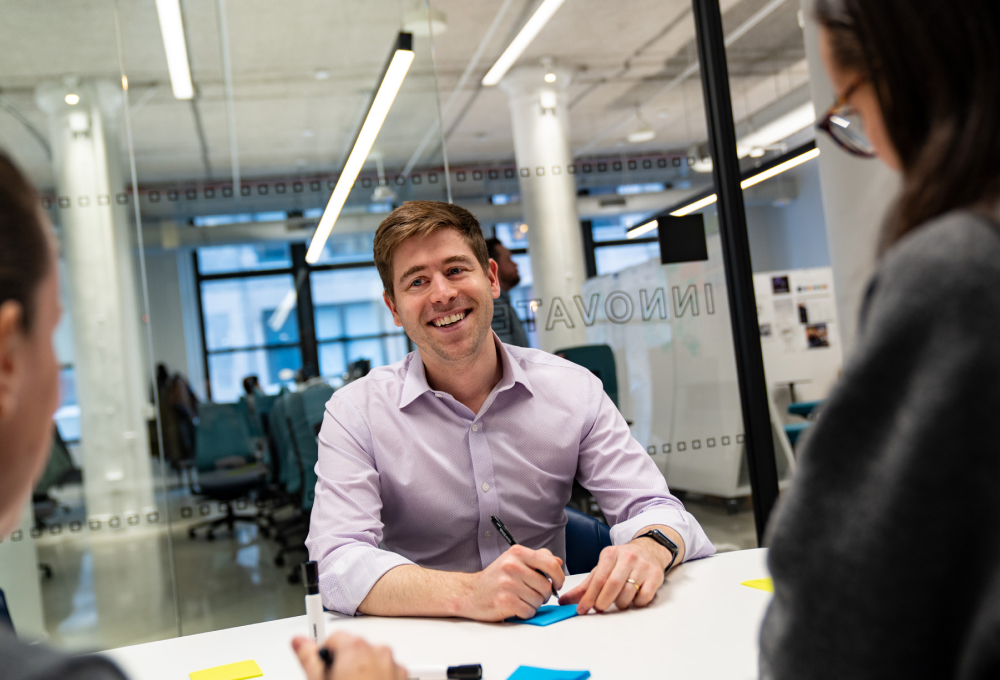 Man smiling in an interview